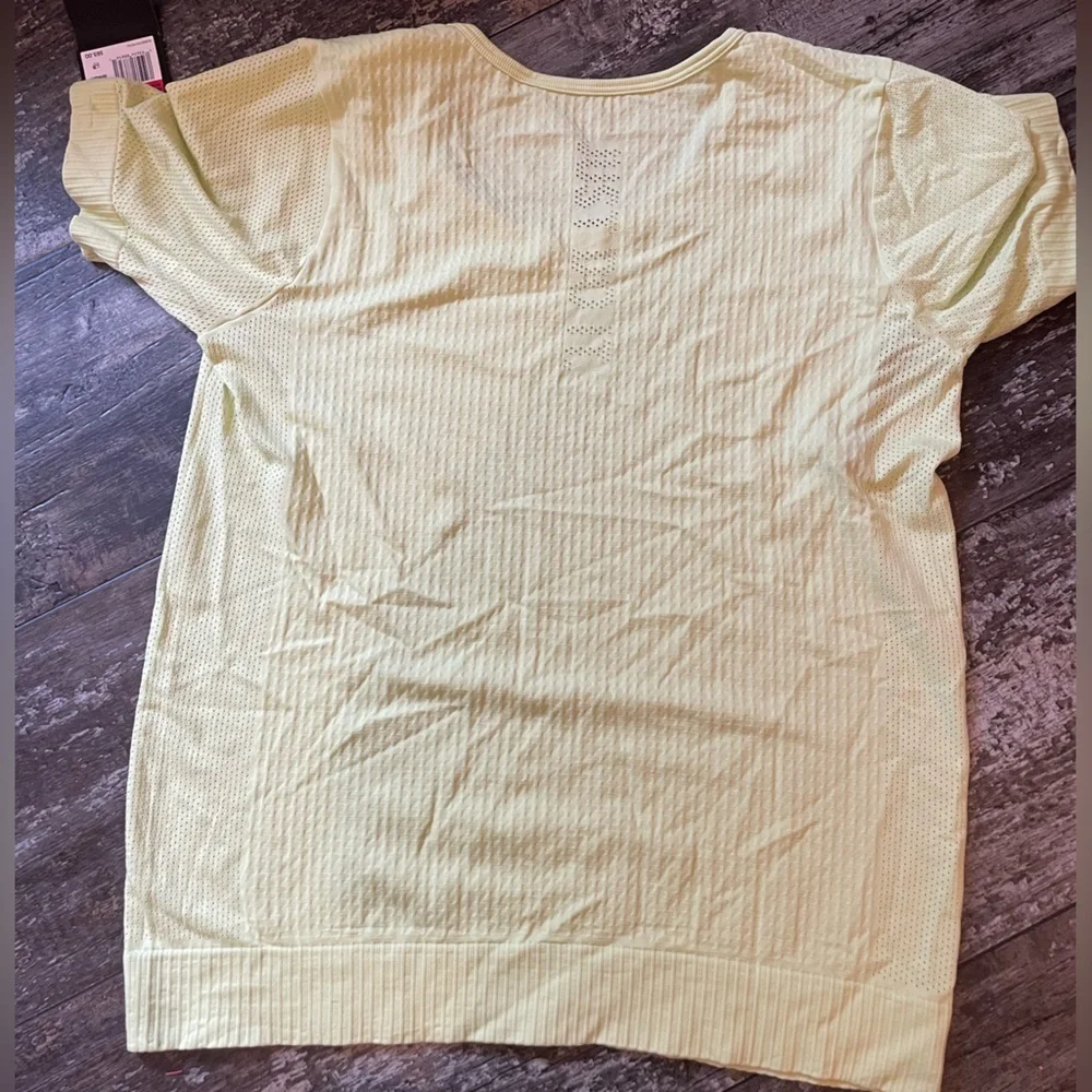 Nike Lemon Yellow Mesh Tee NWT Super Cute! Says let’s do it down the back!